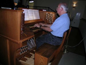 Louis Mayer playing a Golding and Woods pipe organ at First English Lutheran Church in Metairie. 