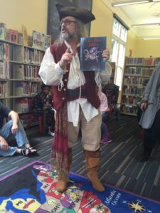 Ol' Chumbucket reads to kids at Hubbell Library in Algiers Point