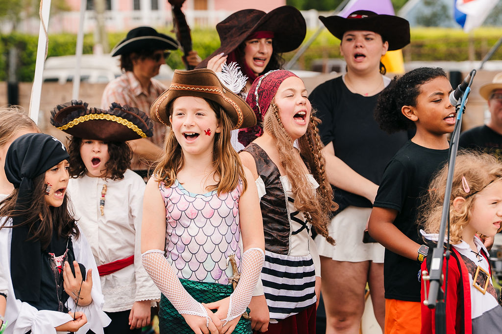 Confetti Park Players singing songs on Family Pyrate Day