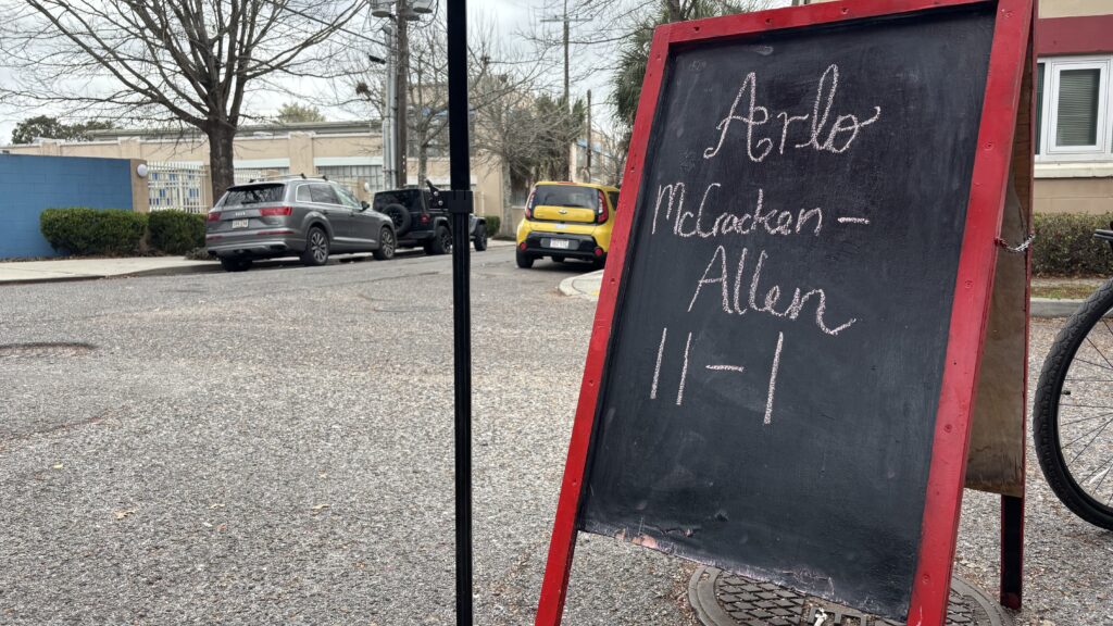 Sign in front of Bywater Bakery advertises 12 year old Arlo's performance